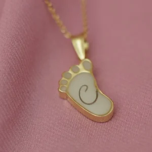 Colgante Un Pie de leche materna personalizado con diseño de huella de bebé y piedra elaborada con leche materna.
