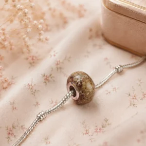 Charm con cenizas
